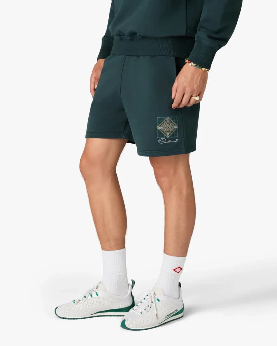 Men's White & Green Khopesh Sneaker — on model