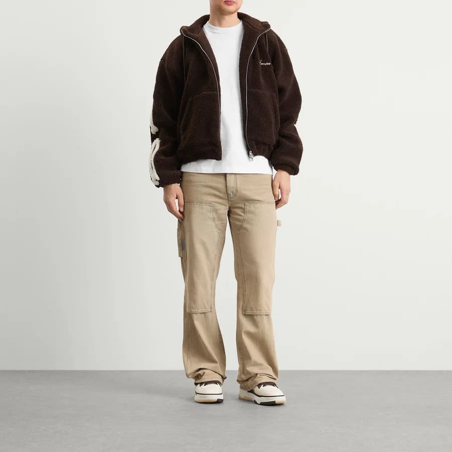 Bones Fleece Zip Hoodie — Dark Brown — on model
