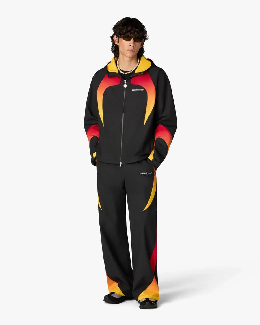 Black & Orange Gradient Track Pants — on model